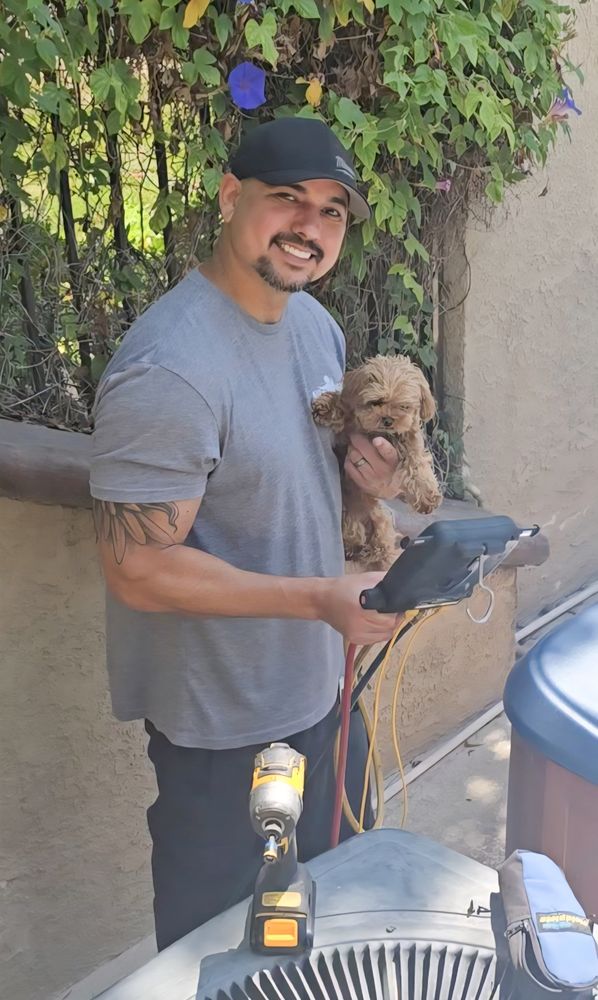 Michael Rubio with his dog on the job